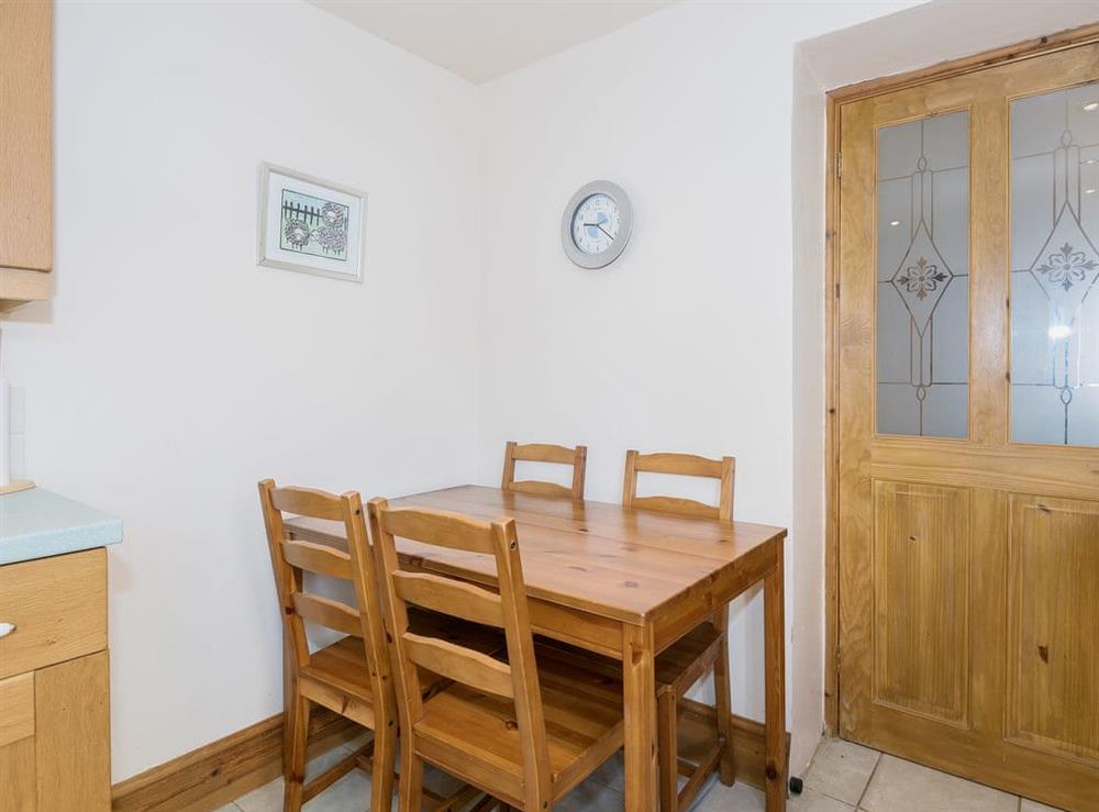 Kitchen/diner with tiled floor at Lazy Cottage in Haverigg, near Millom, Cumbria