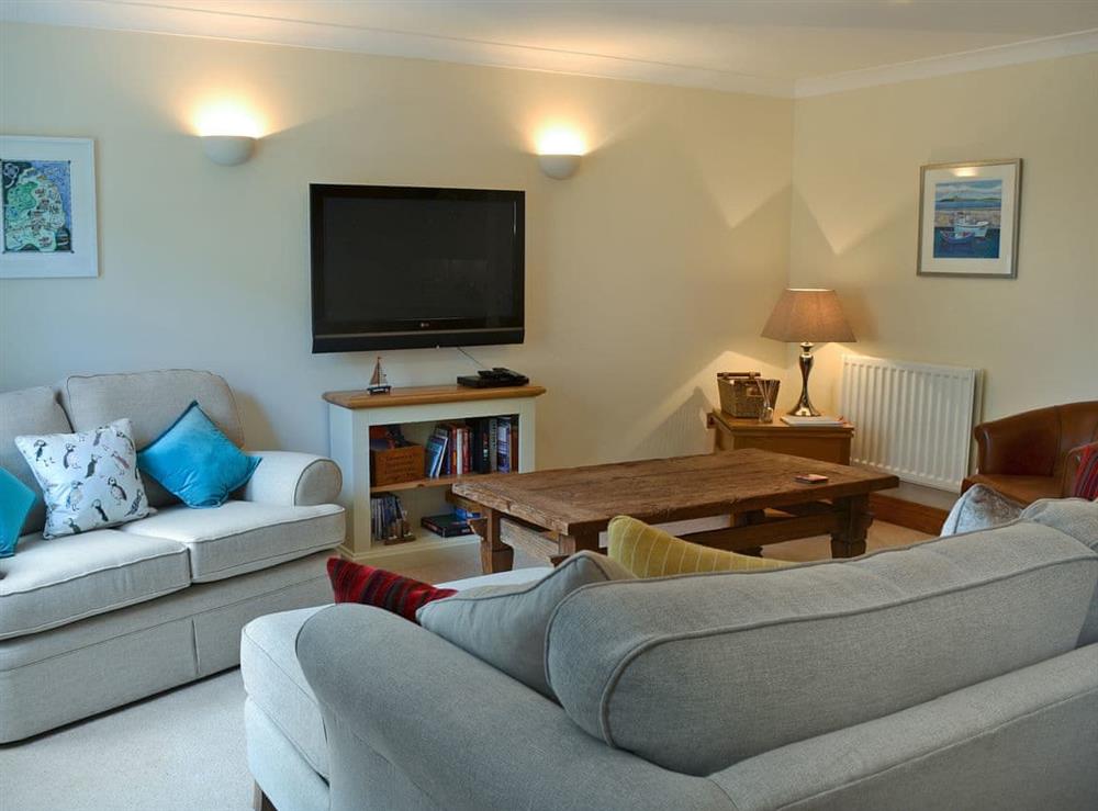 Large, comfortable living area at Lazy Puffin in Beadnell, near Alnwick, Northumberland