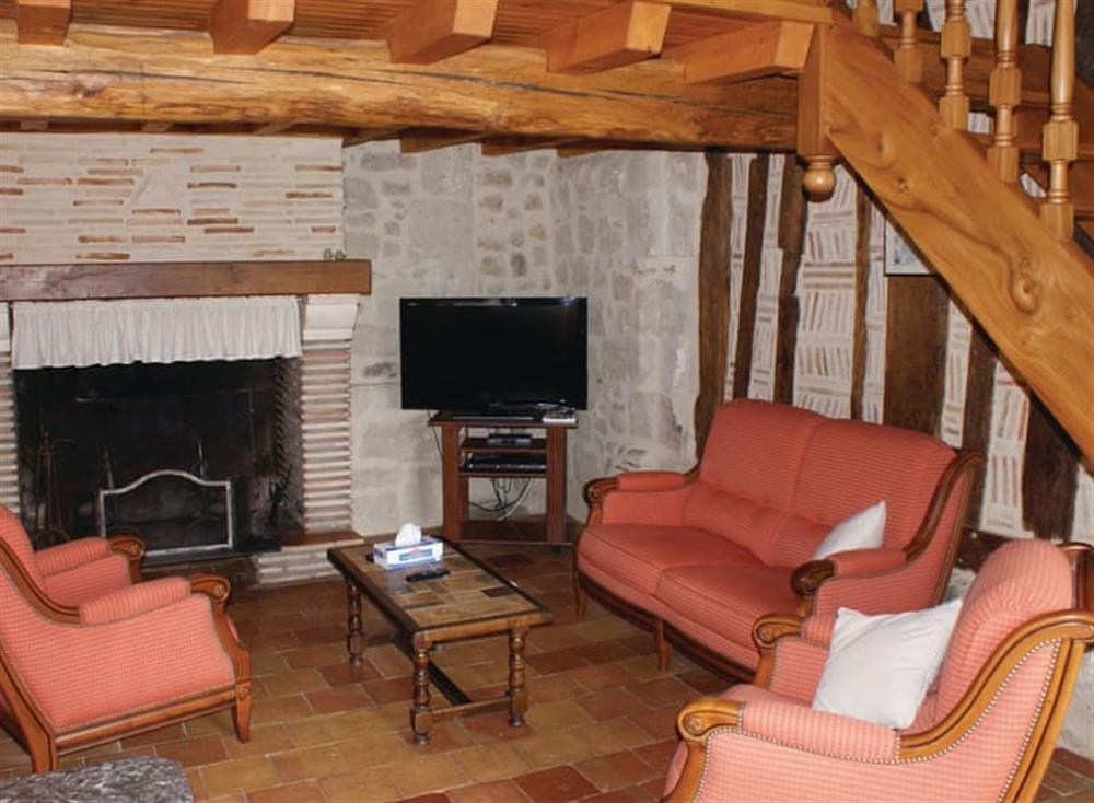 Living area at Le Vieux Pommier in Bourgougnague, Lot-et-Garonne, France