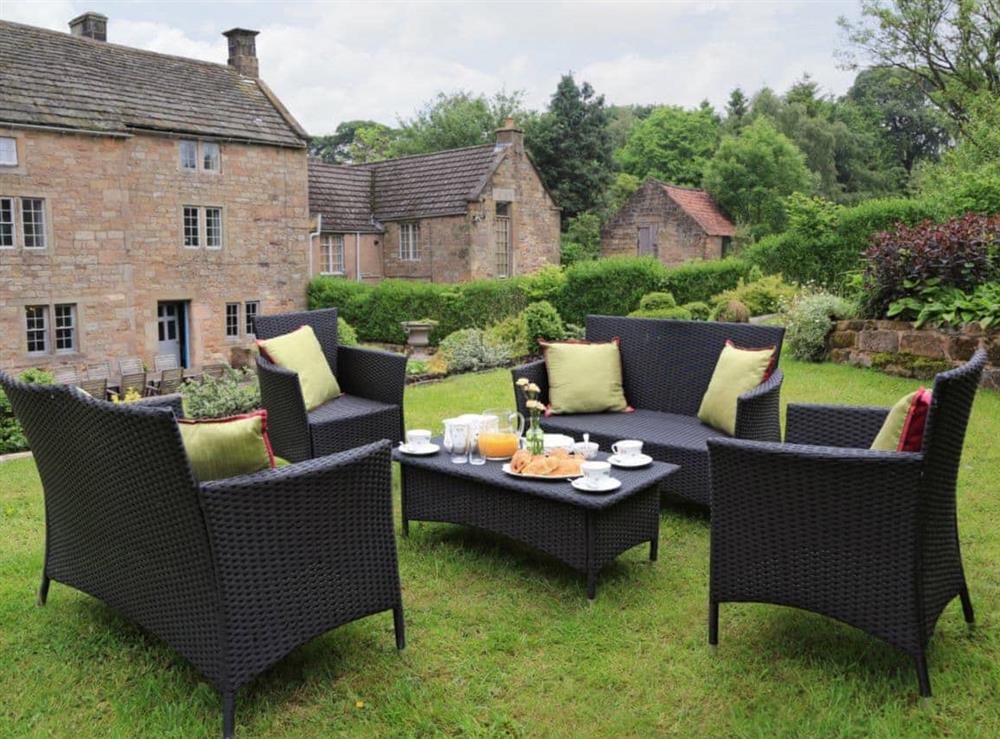 Outdoor furniture on an upper lawn