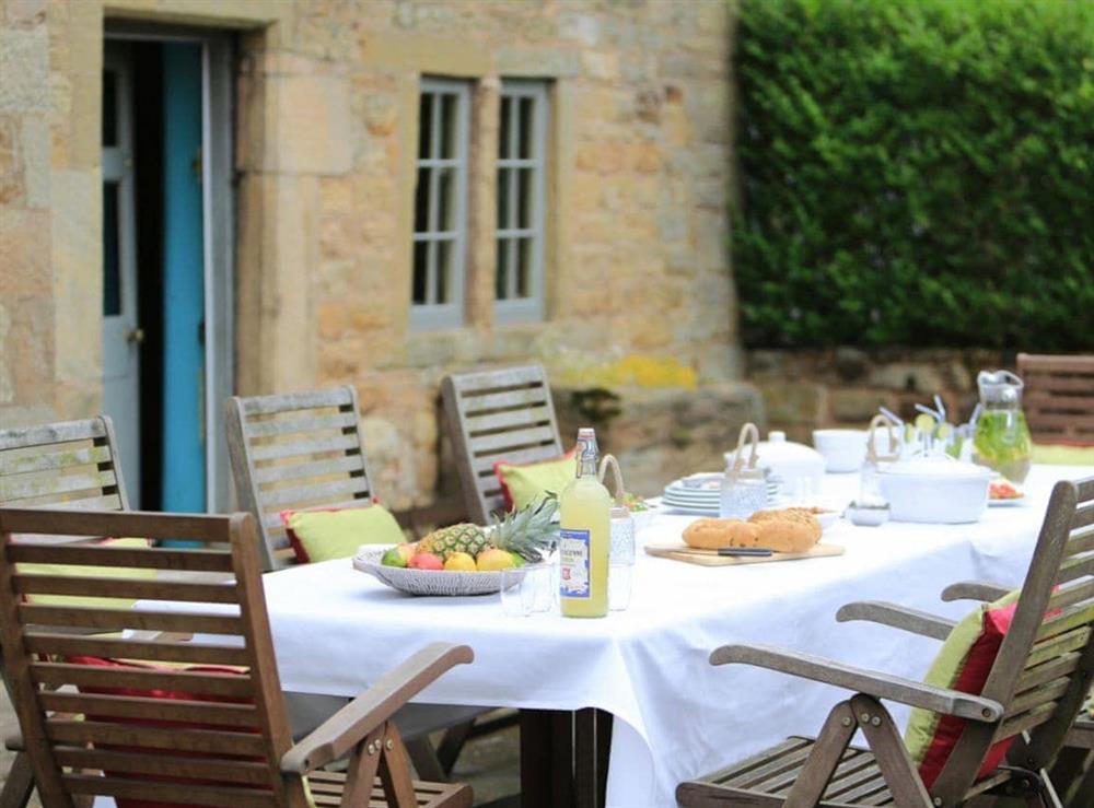 Patio with furniture suitable for outdoor dining at Lea Hall in Matlock, Derbyshire., Great Britain