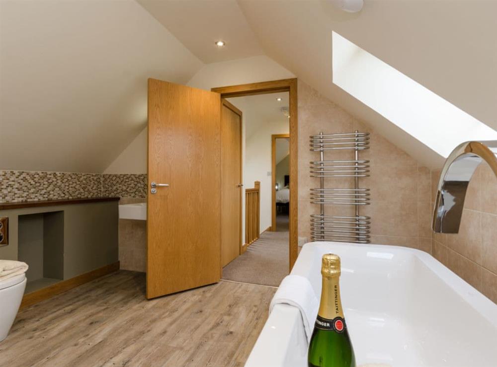 Family bathroom with separate shower at Swallow Cottage, 