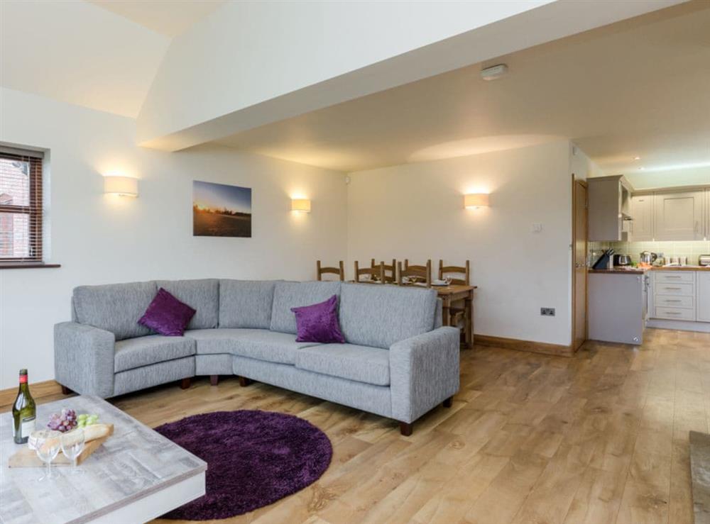 Open plan living space at Swallow Cottage, 