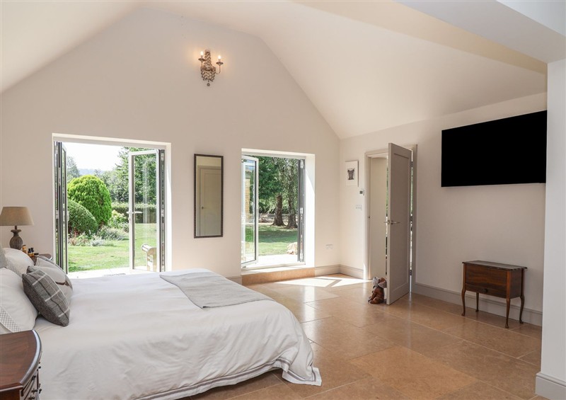 This is a bedroom (photo 3) at Leafield Cottage, Brockworth