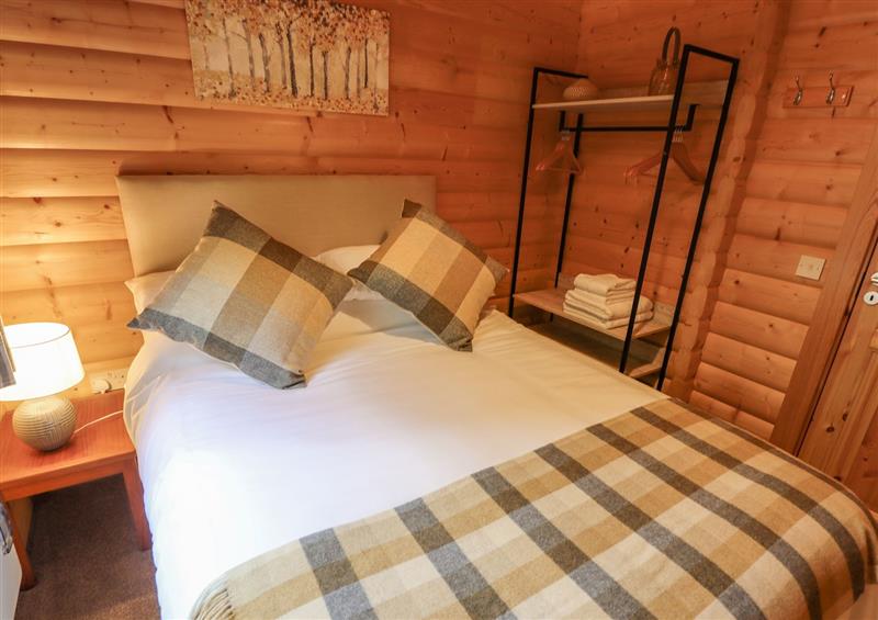 A bedroom in Leafy Hollow Lodge at Leafy Hollow Lodge, Louth