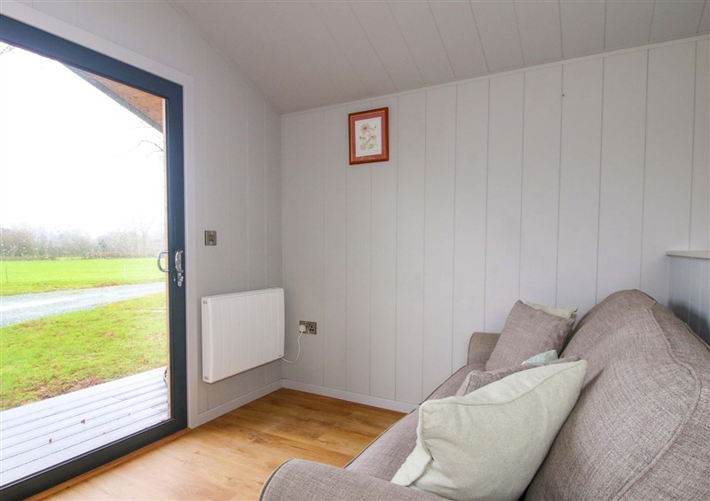 Enjoy the living room at Leafy Oaks Cabin, Munslow