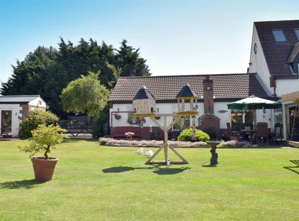 Spacious garden and grounds at Leanda Lodge in Burgh Castle, near Great Yarmouth, Norfolk