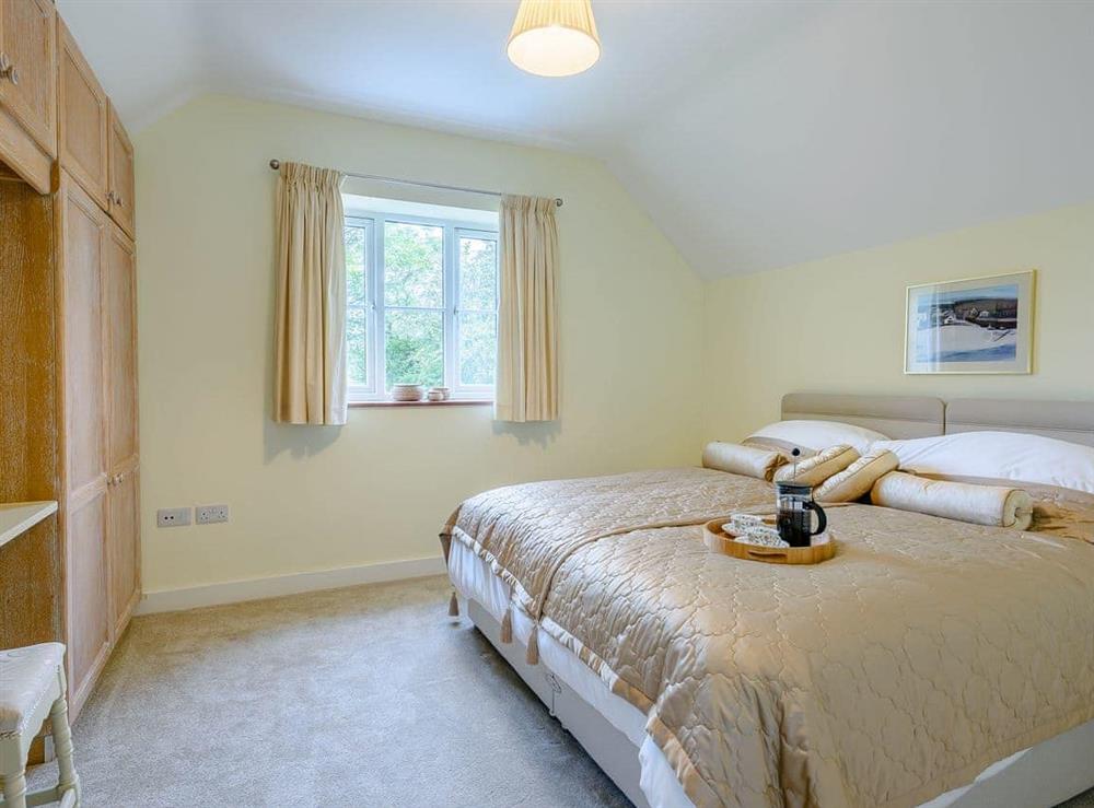 Comfortable bedroom with en-suite shower room at Leatherpool Place in Wiveton, near Holt, Norfolk