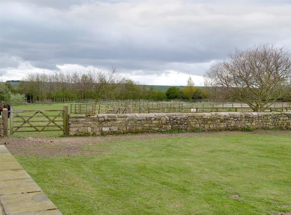 Patio and lovely rural view at Bell Cottage, 