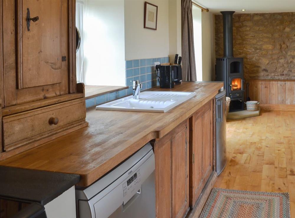 Well equipped kitchen area at Bell Cottage, 