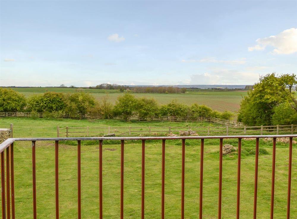 Far-reaching views from the first floor balcony at Mullins Cottage, 