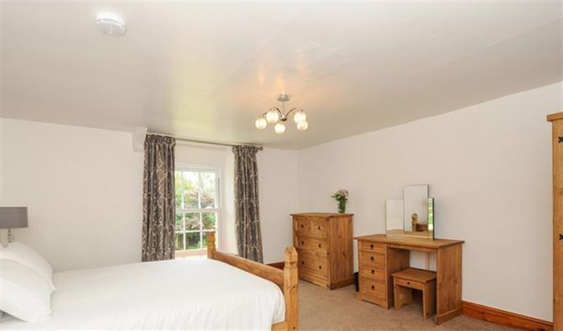 This is a bedroom at Lee Barton Farmhouse, Woodford near Kilkhampton