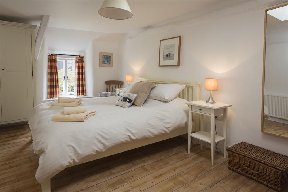 Master bedroom with King-size bed at Lee Cottage in , Stokenham, Kingsbridge
