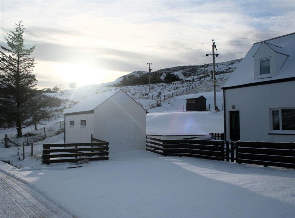 Picturesque in winter snow at Lephin Cottage in Portree, Isle Of Skye