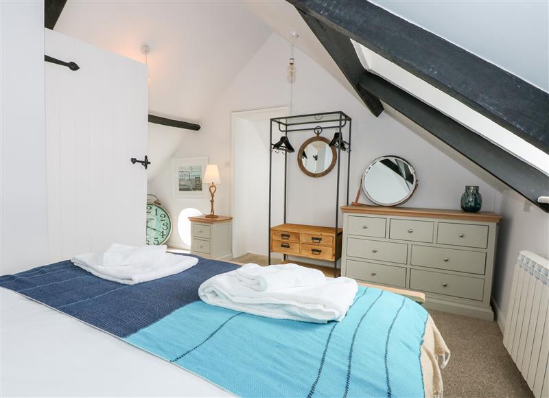A bedroom in Leveret Cottage at Leveret Cottage, Docking