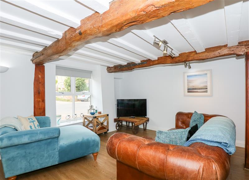 Relax in the living area at Leveret Cottage, Docking