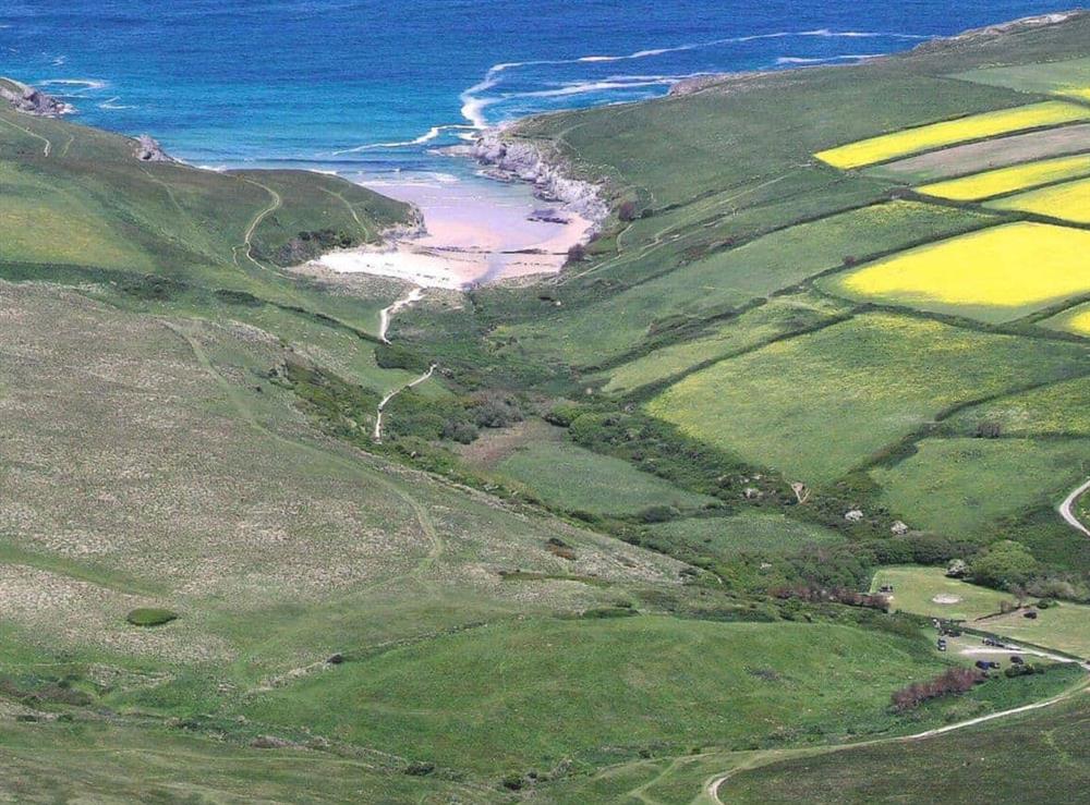 Aerial shot of Porth Joke beach adjacent to Cubert Common a 15 min walk from the property at Lewannick Piggery, 