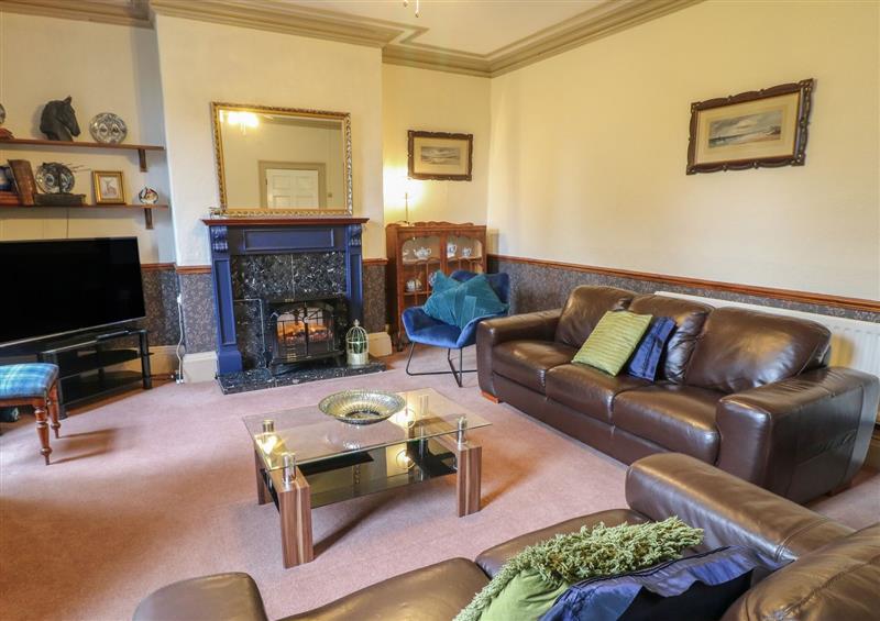 Relax in the living area at Ley Fields Farmhouse, Cheadle