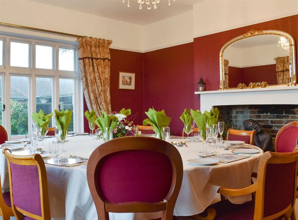 Elegant dining room at Leygreen Farmhouse in Beaulieu, near Brockenhurst, Hampshire