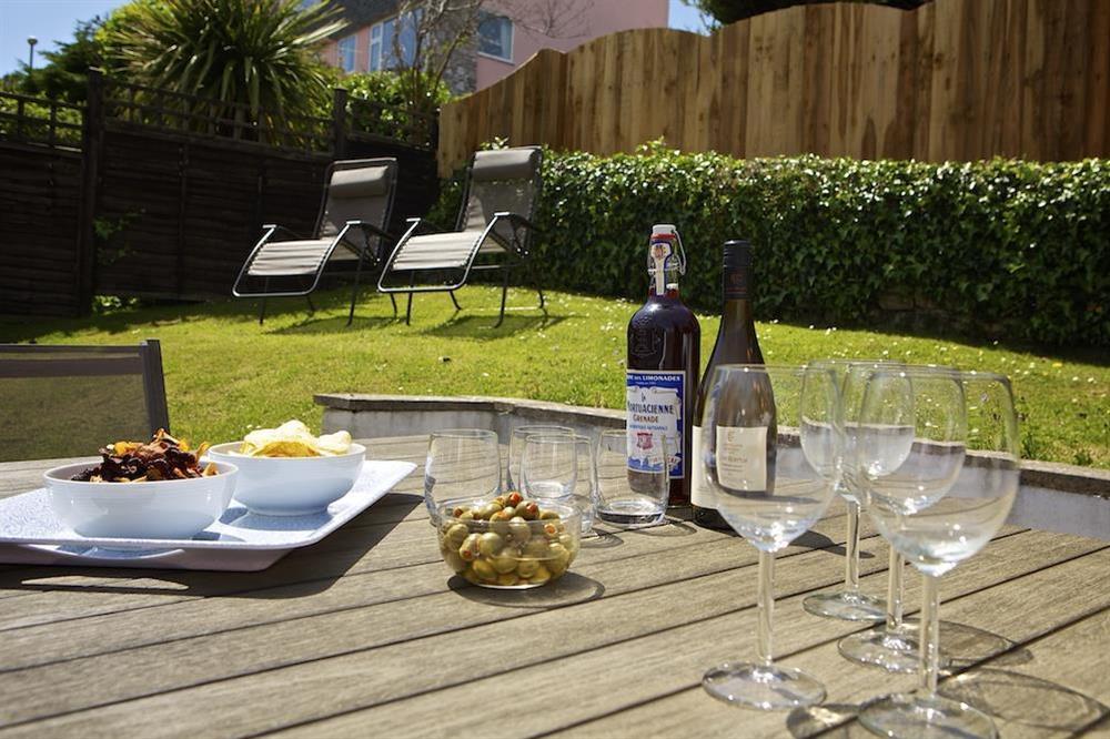 Enjoy a glass of wine in the sunny garden at Leylands in Allenhayes Road, Salcombe