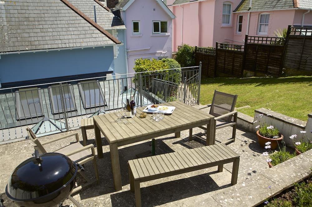 Sloping rear garden, sunny terrace with garden furniture and barbecue (photo 2) at Leylands in Allenhayes Road, Salcombe