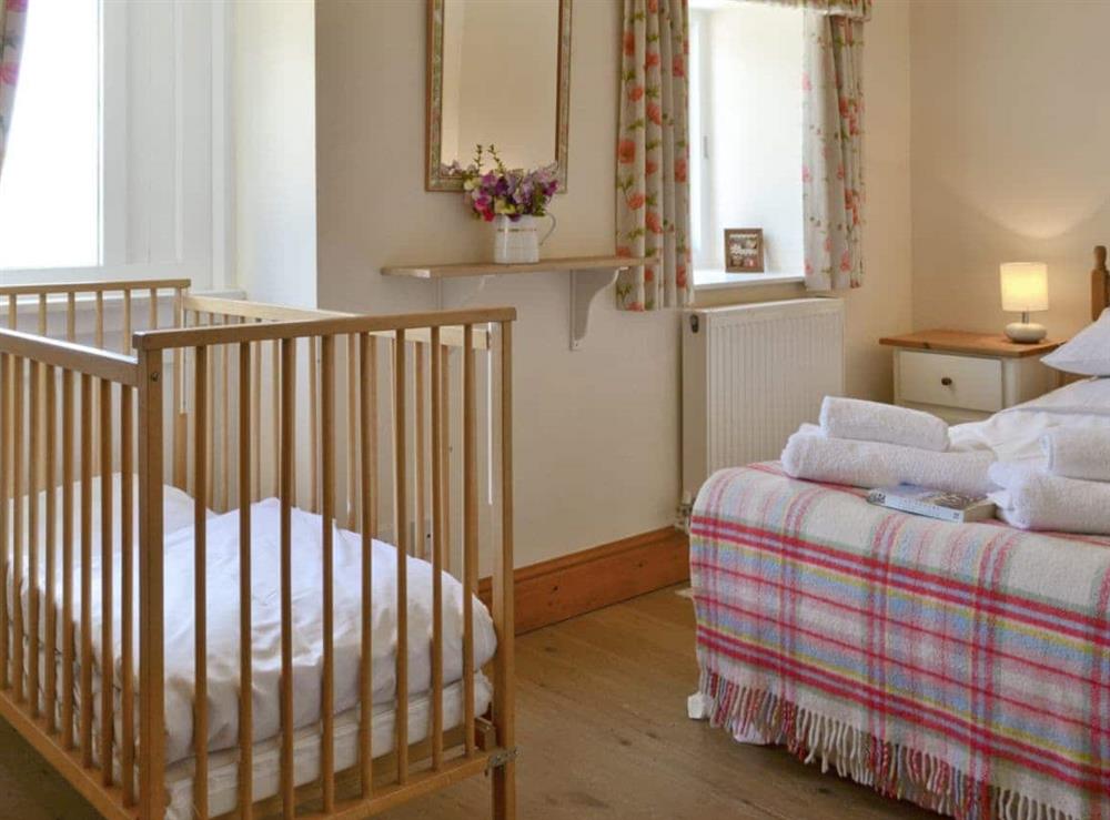 Useful cot in second double bedroom at Mole End, 