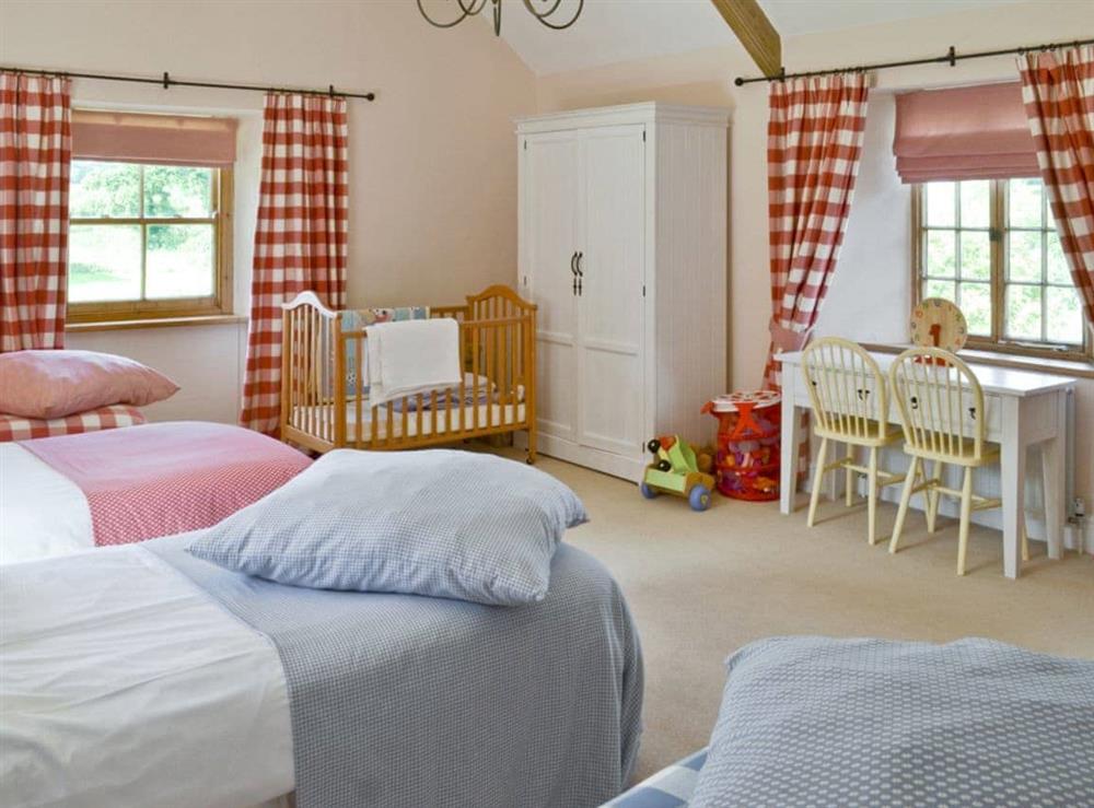 Large capacity children’s bedroom with play area at Toad Hall, 