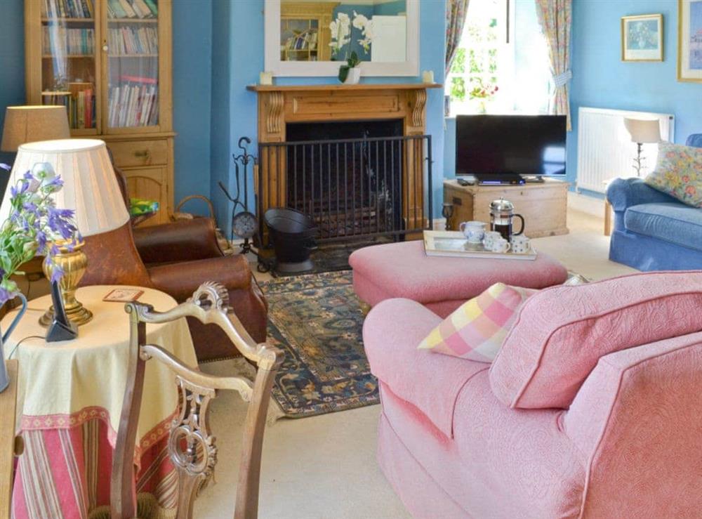 Living room packed with heritage features at Toad Hall, 