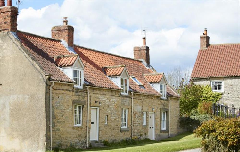 Pretty stone cottage situated in the Castle Howard estate village of Coneysthorpe at Librarians Cottage, Coneysthorpe