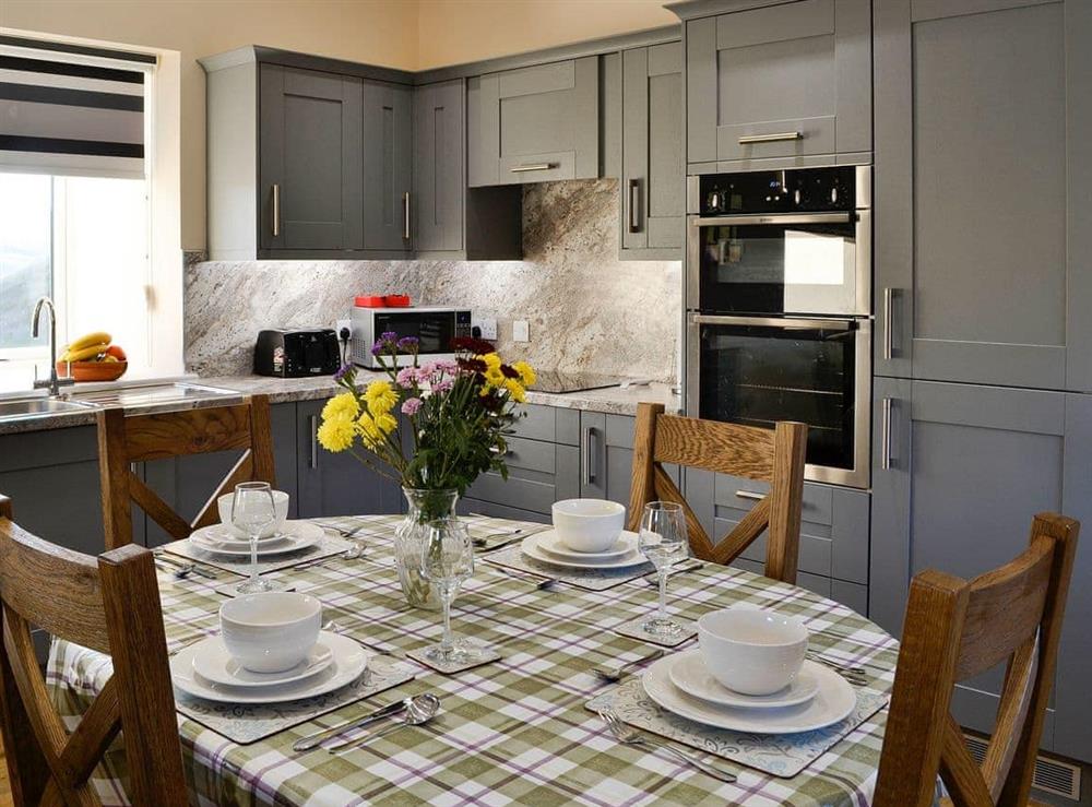Modest dining area close to the kitchen at Liftingstane Dairy Cottage, 