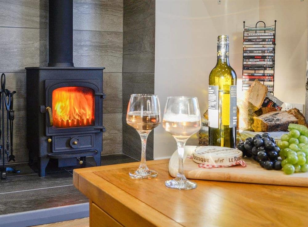 Warm and cosy open plan living area at Liftingstane Dairy Cottage, 