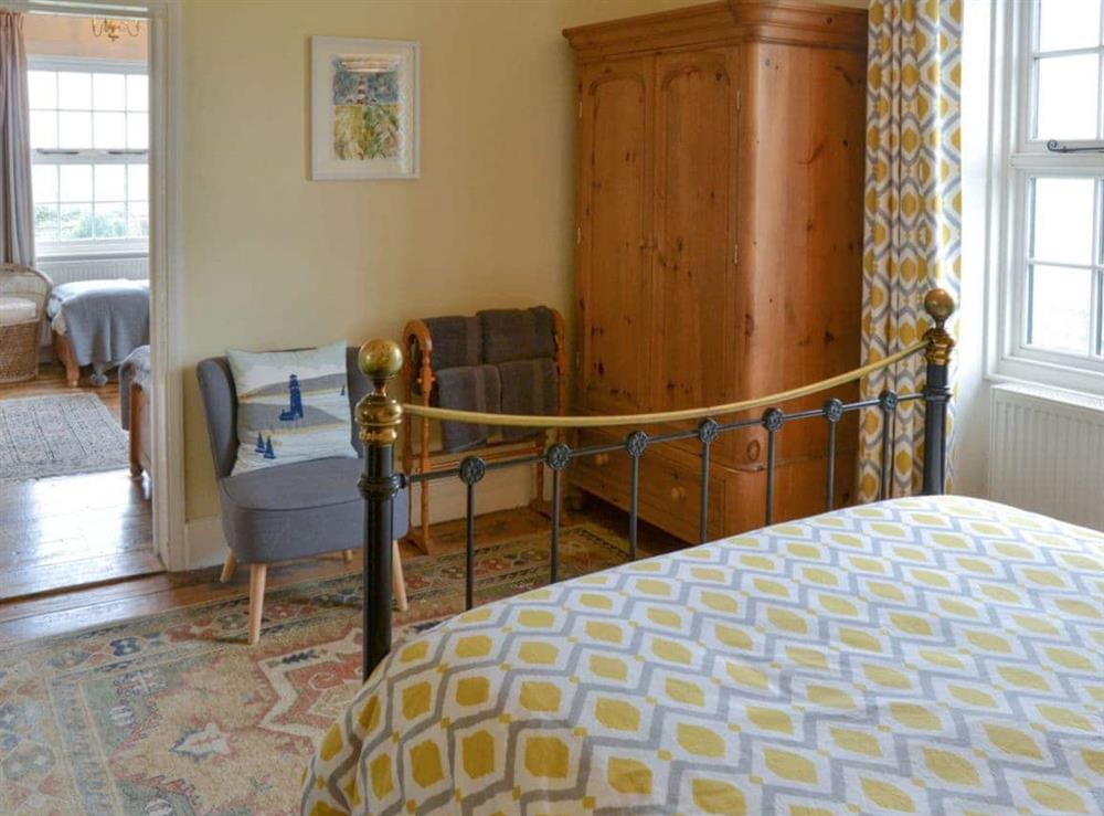 Ample storage within double bedroom at Lighthouse Cottage in Happisburgh, Nr Cromer, Norfolk., Great Britain