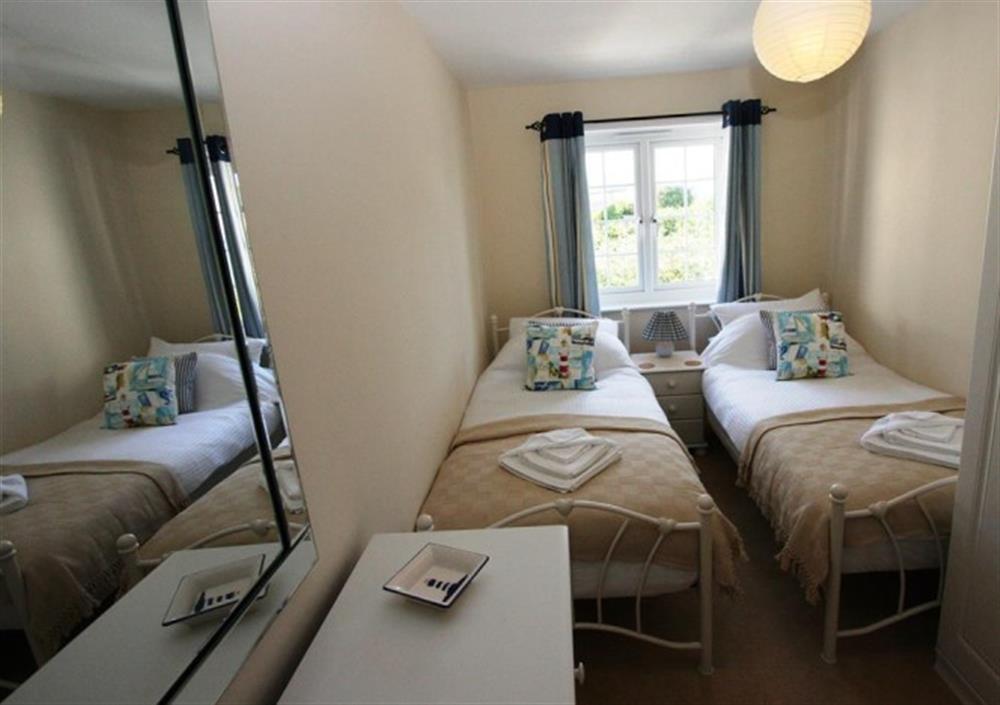 Twin bedroom at Lighthouse Cottage in Trevarrian