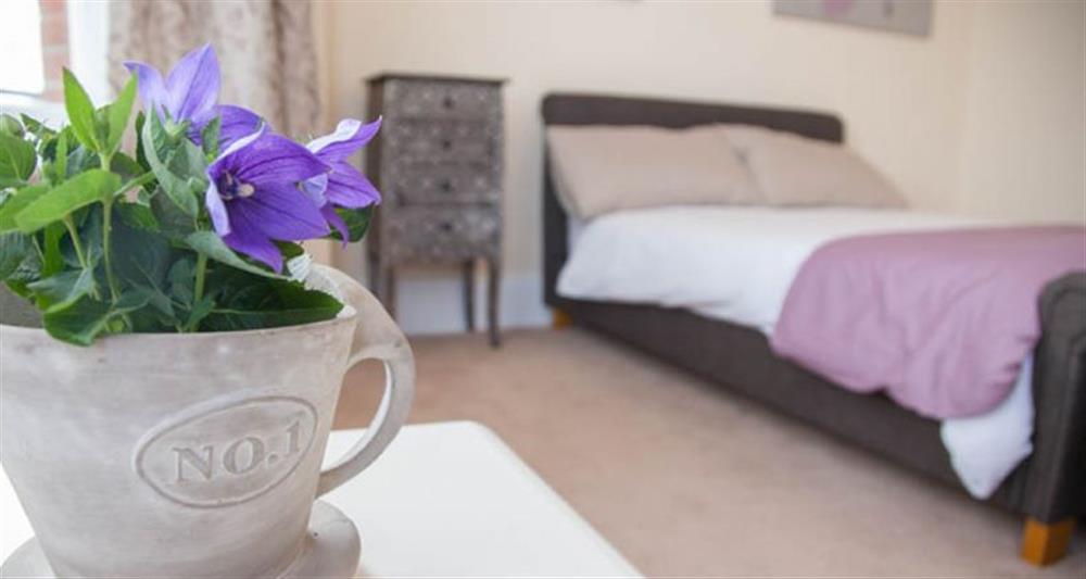 First floor:  Bedroom with double bed at Lighthouse View, Cromer