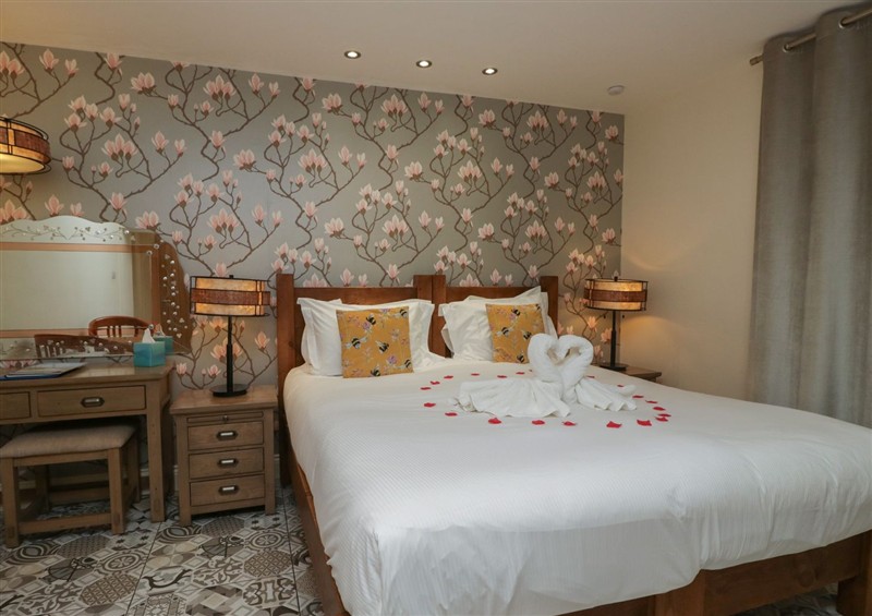 A bedroom in Lilac Cottage at Grange Boutique (photo 2) at Lilac Cottage at Grange Boutique, Grange-Over-Sands