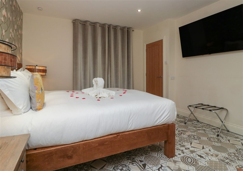 A bedroom in Lilac Cottage at Grange Boutique (photo 3) at Lilac Cottage at Grange Boutique, Grange-Over-Sands