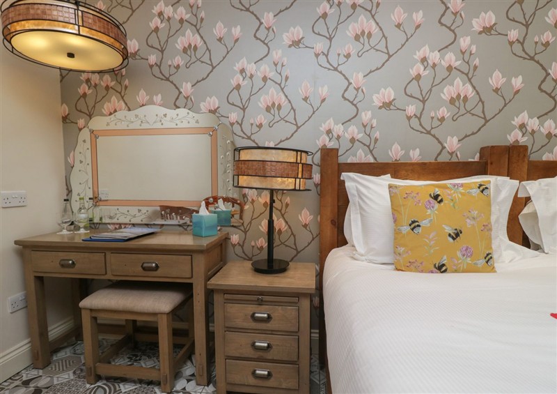 This is a bedroom (photo 2) at Lilac Cottage at Grange Boutique, Grange-Over-Sands