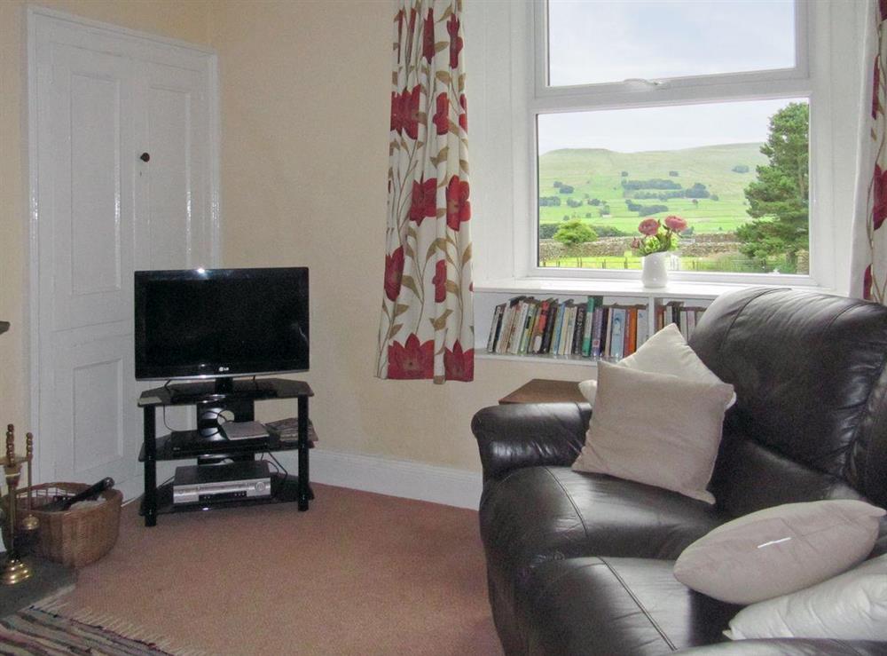 Intimate living room with rural views at Lilac Cottage in Sedbusk, near Hawes, North Yorkshire