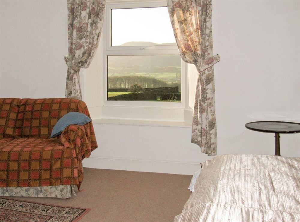 Seating area in master-bedroom at Lilac Cottage in Sedbusk, near Hawes, North Yorkshire