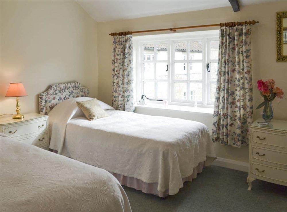 Light and airy twin bedroom at Lilac Cottage in Sinnington, near Pickering, North Yorkshire