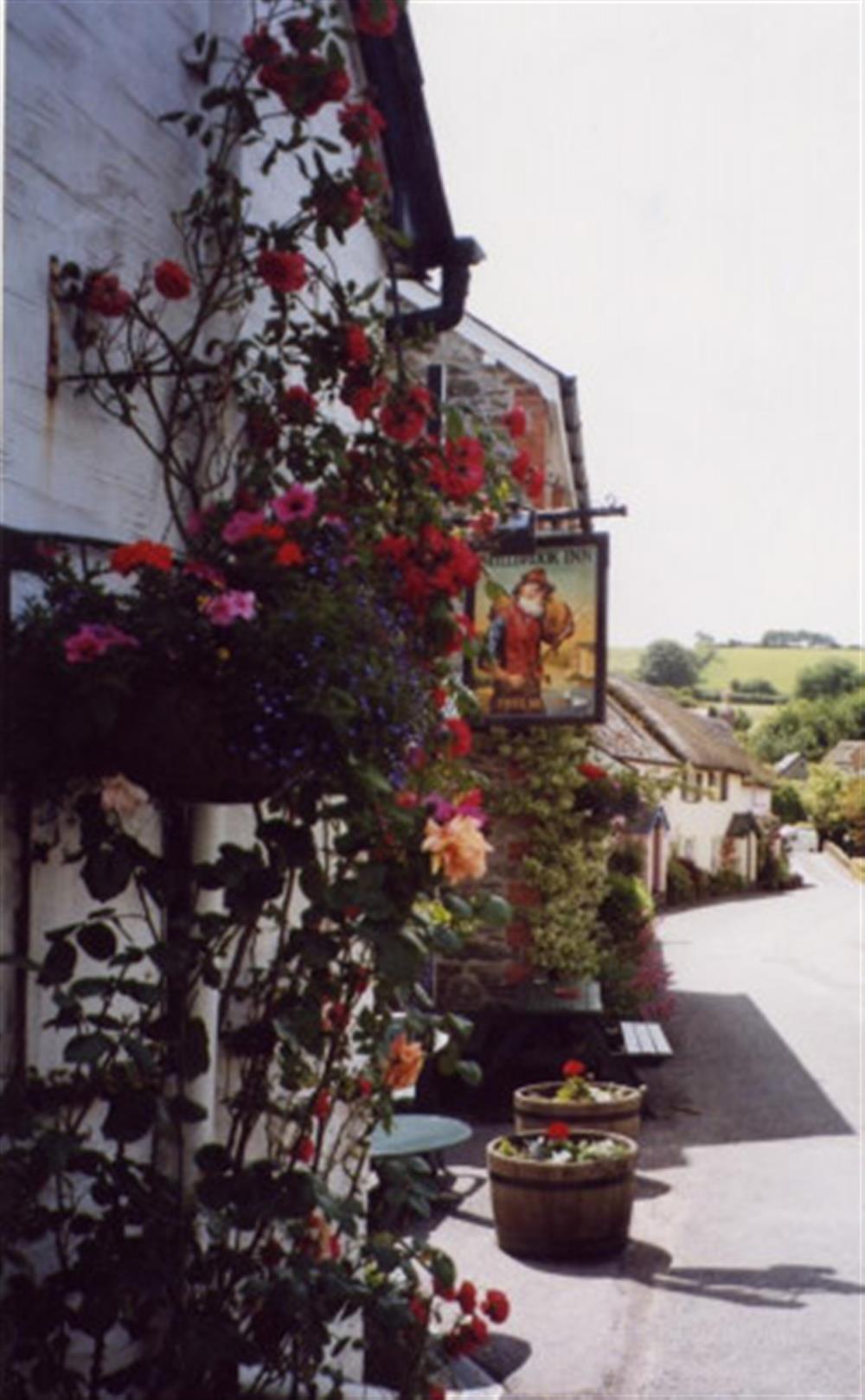 The magnificent Millbrook Inn, a one mile walk away. at Lilac Cottage in South Pool