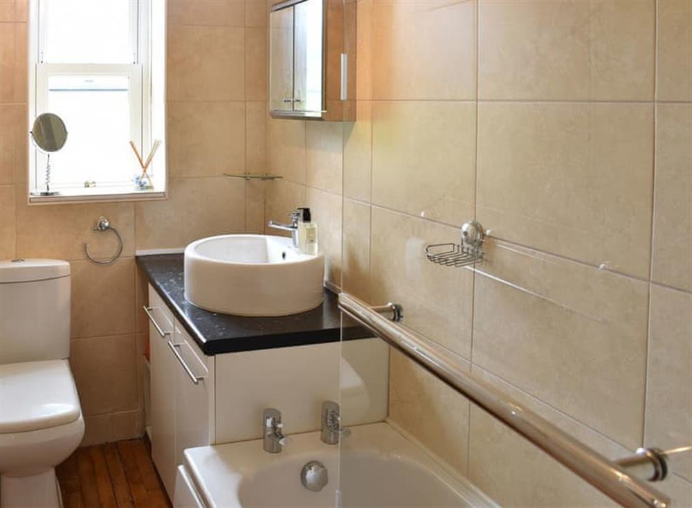 Bathroom with shower over the bath at Lilac Cottage in Westgate, near Bishop Auckland, Durham