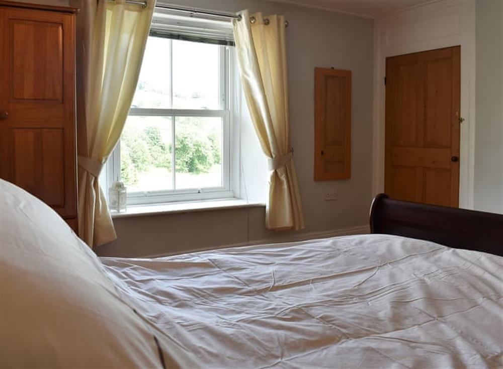 Charming bedroom with double bed at Lilac Cottage in Westgate, near Bishop Auckland, Durham