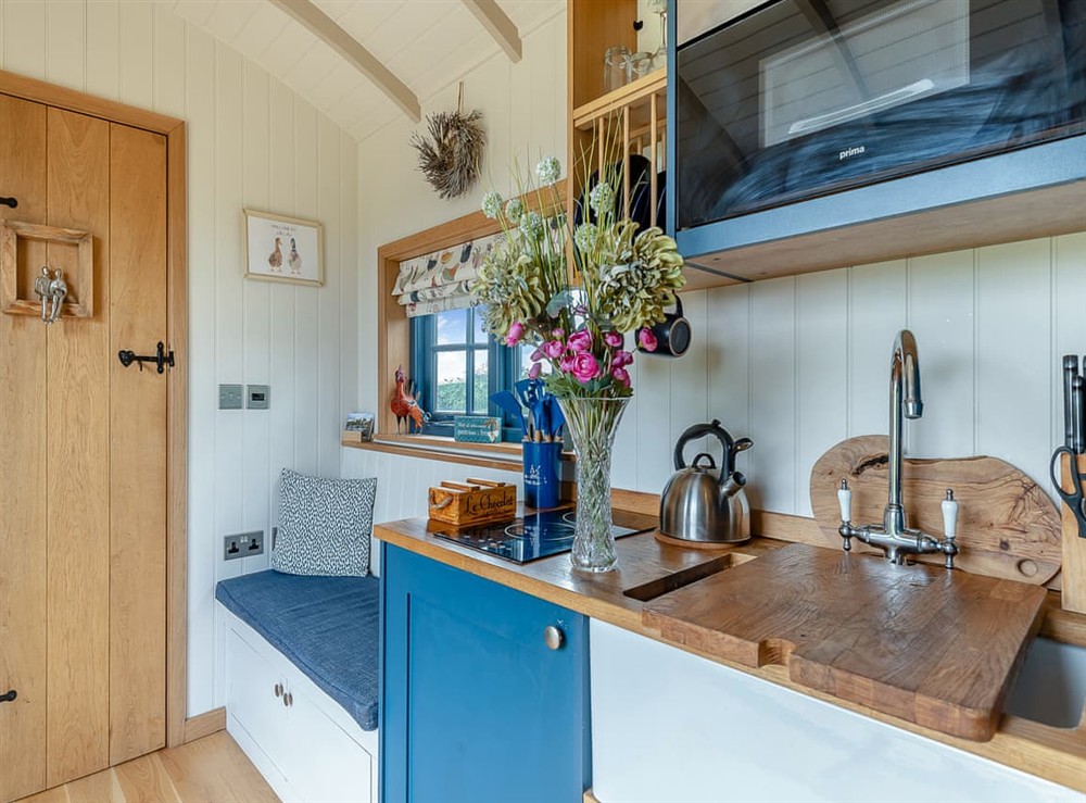 Open plan living space (photo 3) at Lillies Shepherd Hut in Nottingham, Leicestershire