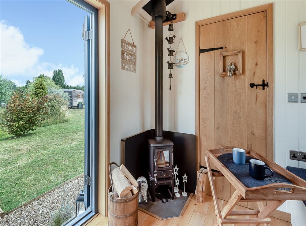 Open plan living space at Lillies Shepherd Hut in Nottingham, Leicestershire