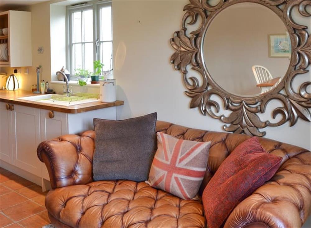Kitchen with dining area & sofa (photo 3) at Lillipit Cottage in Breage, near Helston, Cornwall