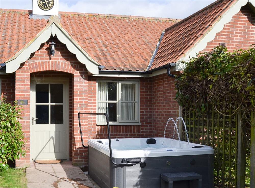 Hot tub at Lily Broad Cottage in Rollesby, near Great Yarmouth, Norfolk