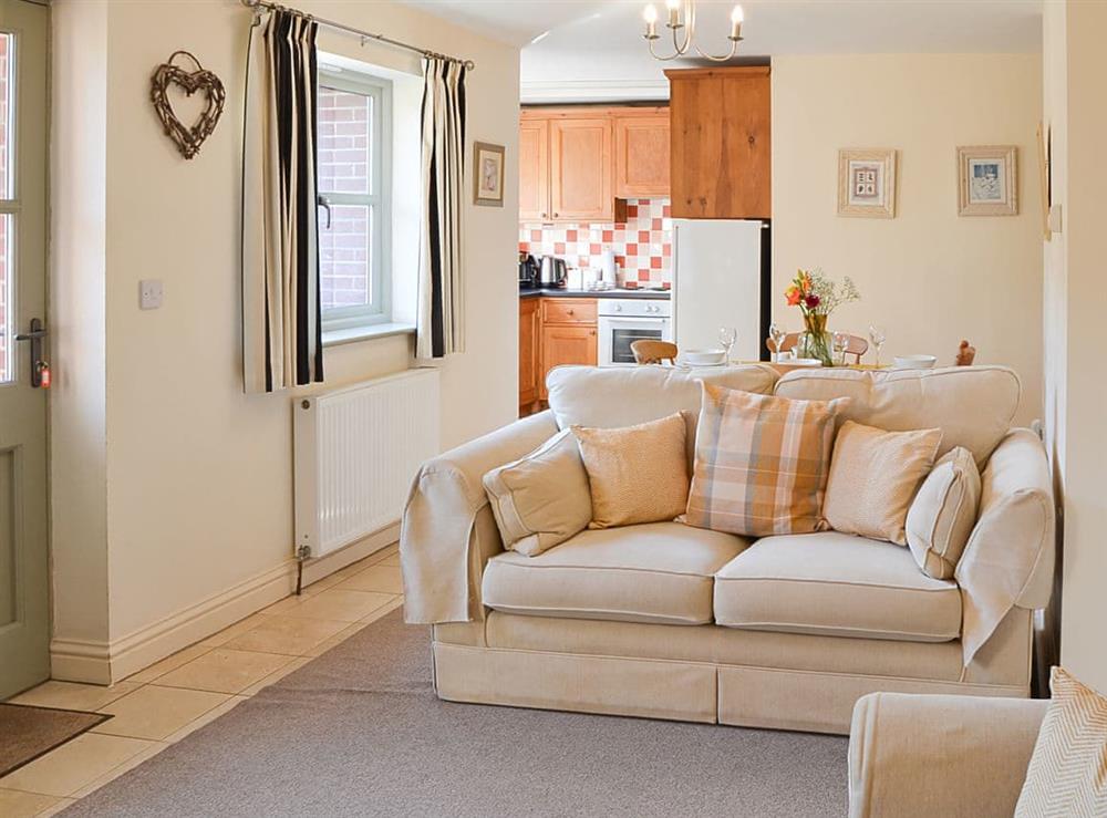 Open plan living space at Lily Broad Cottage in Rollesby, near Great Yarmouth, Norfolk