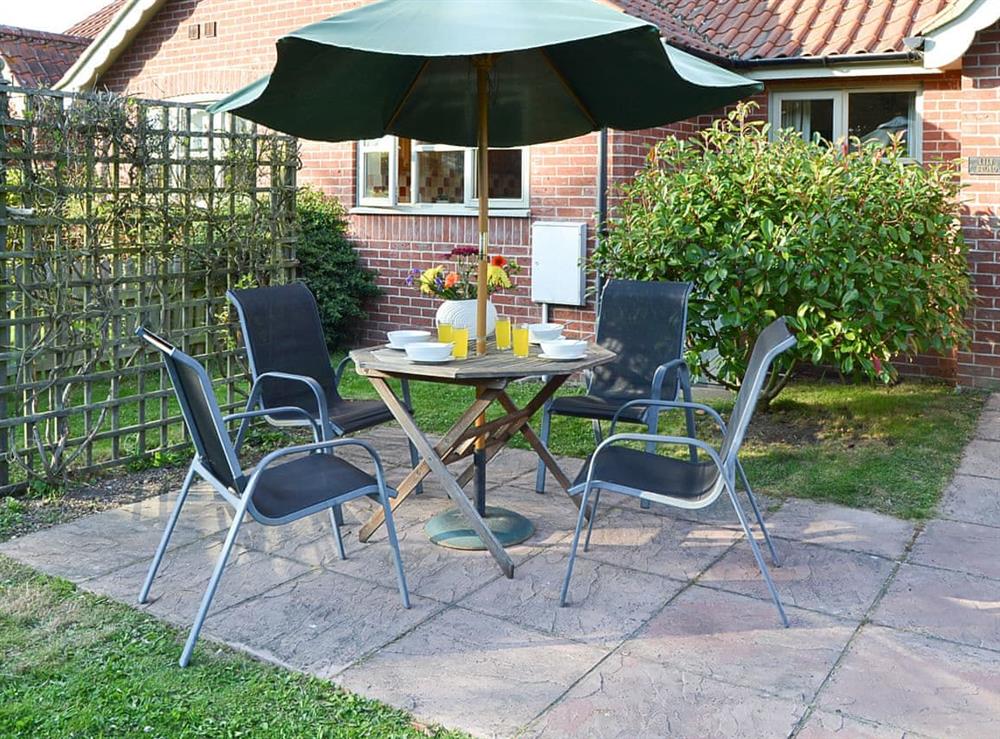 Patio at Lily Broad Cottage in Rollesby, near Great Yarmouth, Norfolk