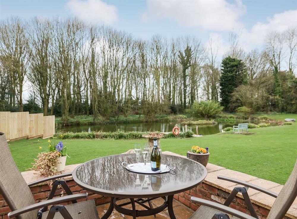 Sitting out area with lovely views at Lily Pad Lodge in Market Stainton, near Louth, Lincolnshire